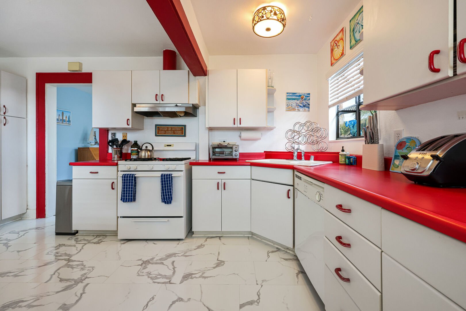 Interior view of the kitchen inside our Sunnyside Up Oceanside rental